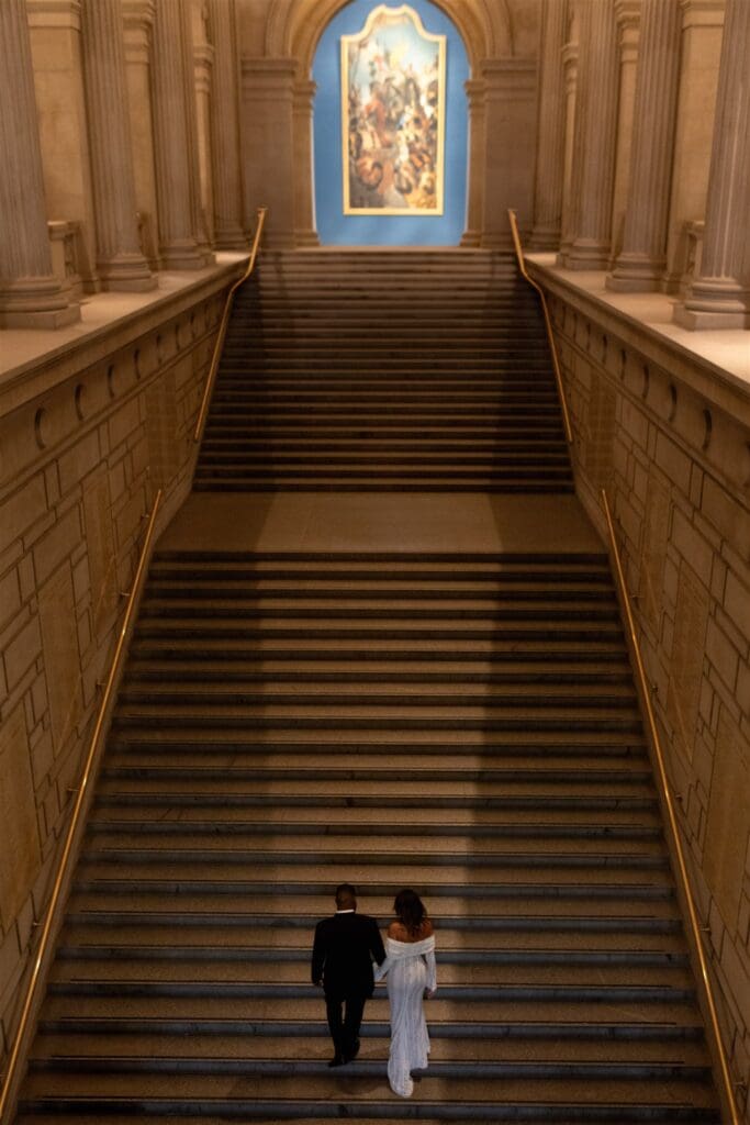 cute couple walking around the MET during their engagement photoshoot