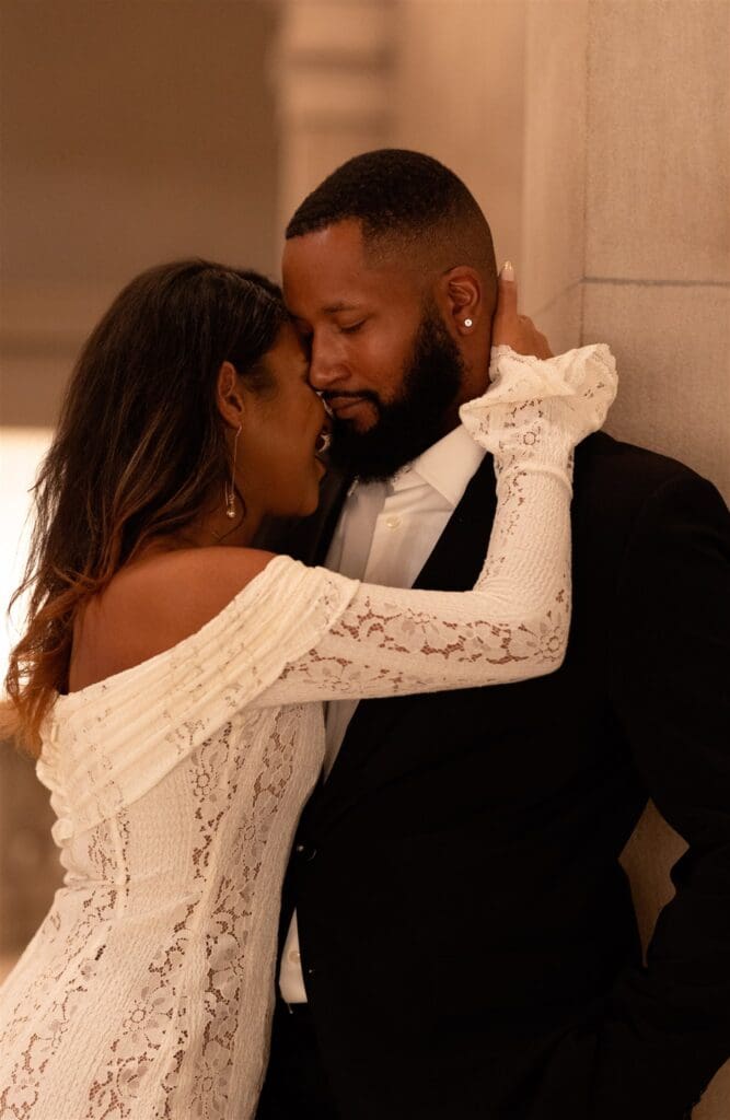 cute couple kissing during their session at the MET