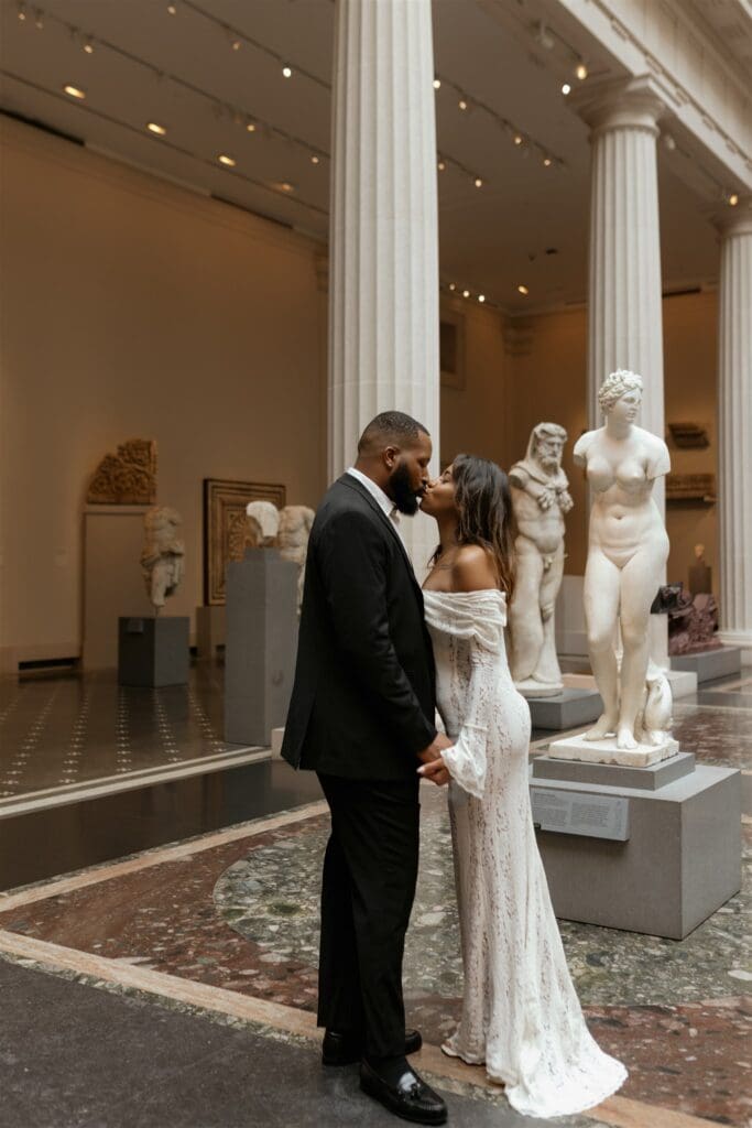 cute picture of the couple kissing during their engagement session