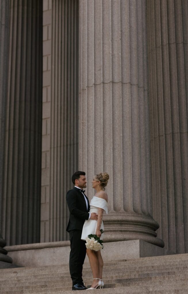 bride and groom looking at each other during their dream bridal session