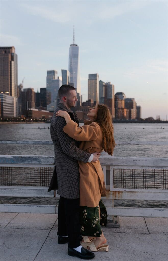 newly engaged couple dancing after their engagement