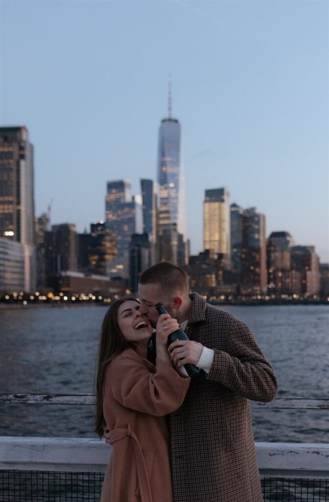 fiance kissing his fiance on the cheek