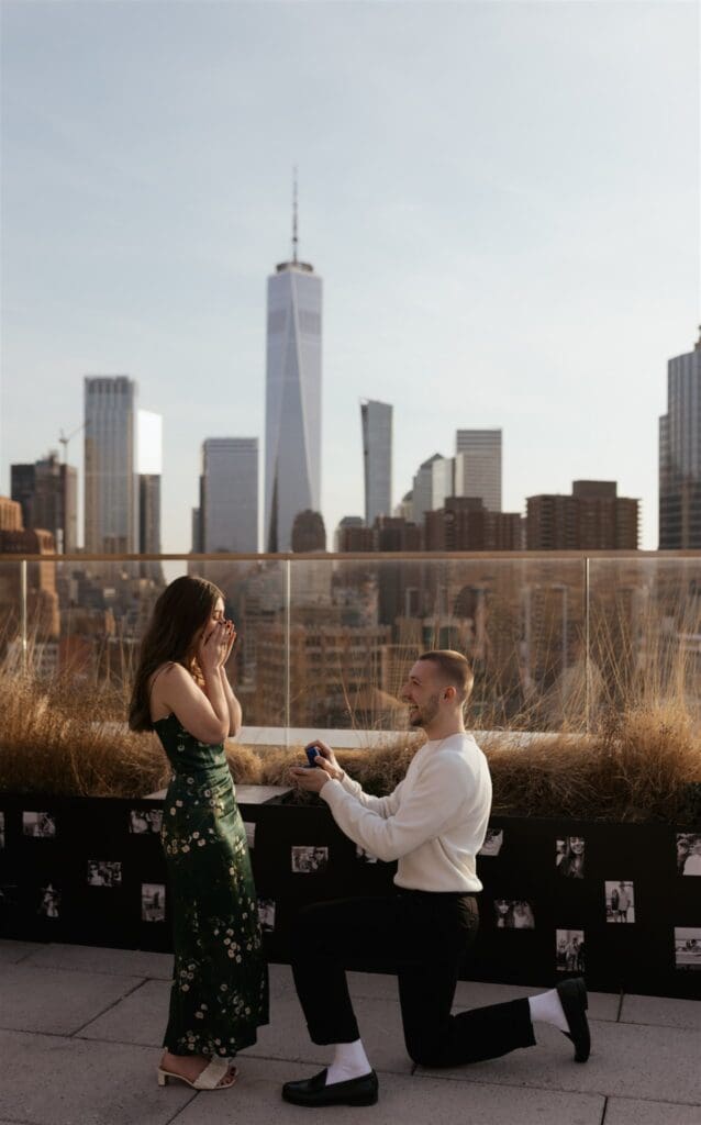 couple holding hands during their proposal
