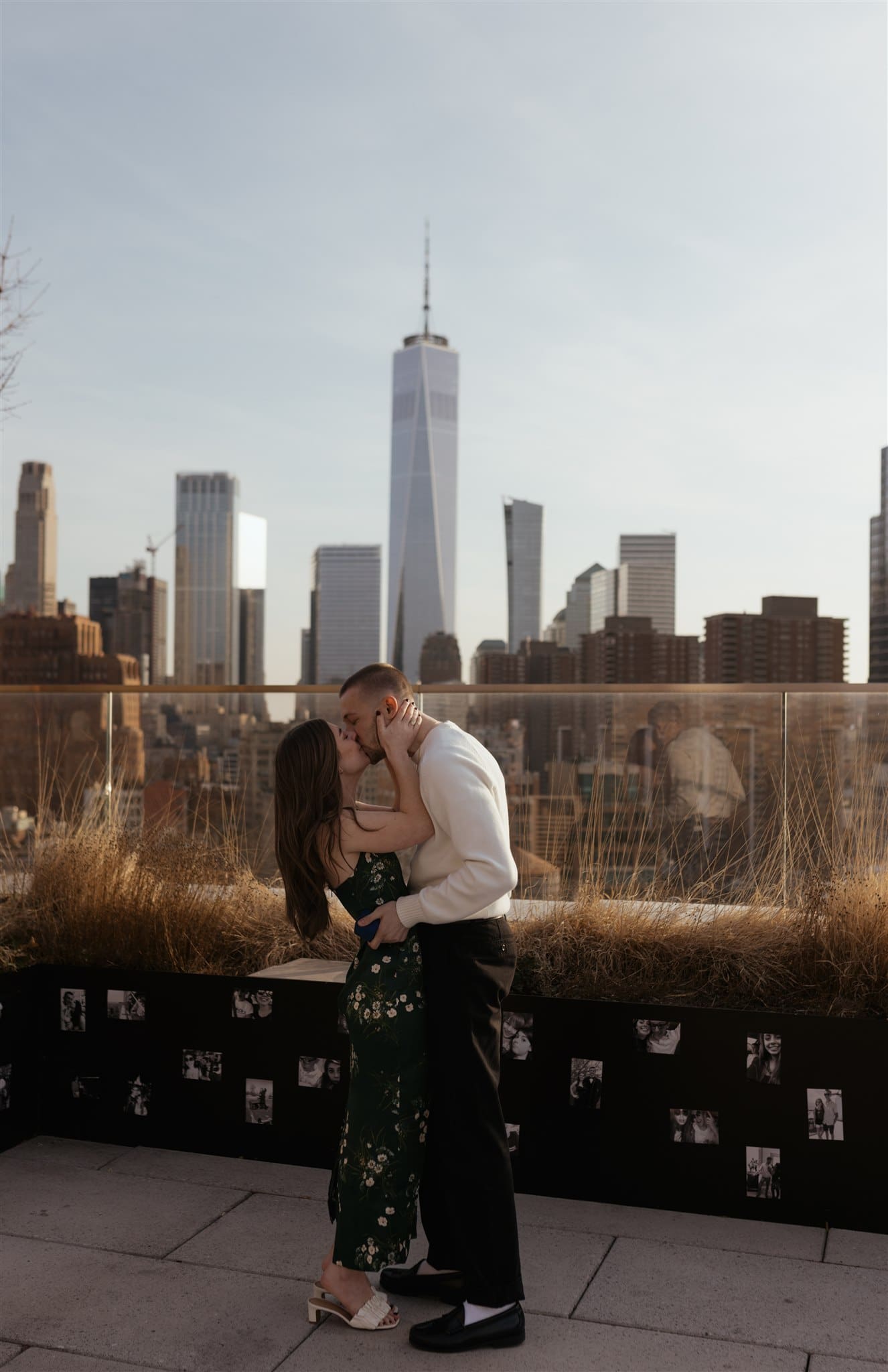 cute picture of the couple kissing after their proposal