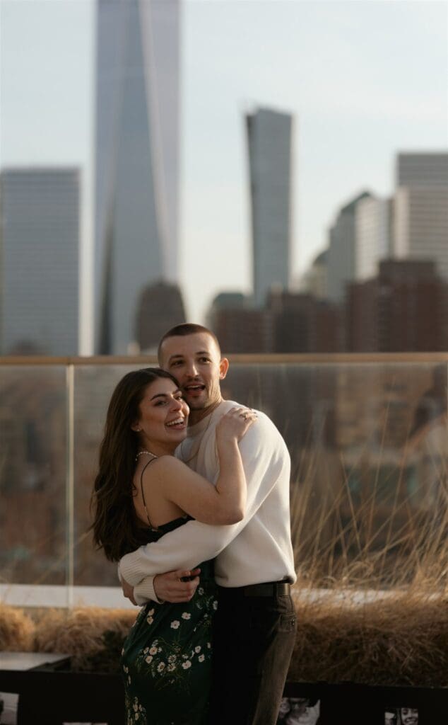 couple posing for the camera during their engagement photos