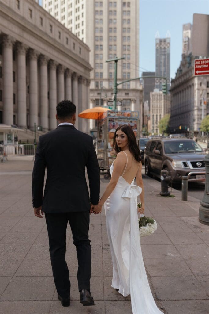 couple walking around NY during their photoshoot