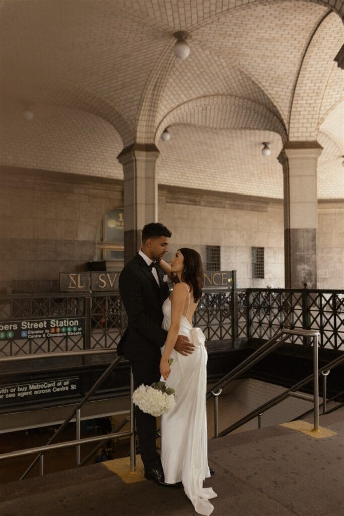 cute couple walking around NYC during bridal portraits