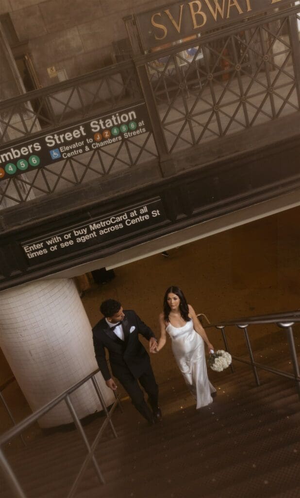 cute couple at the metro after their ceremony