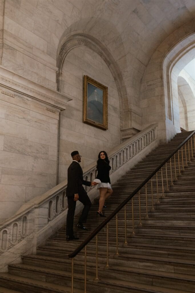 cute couple holding hands during their photoshoot