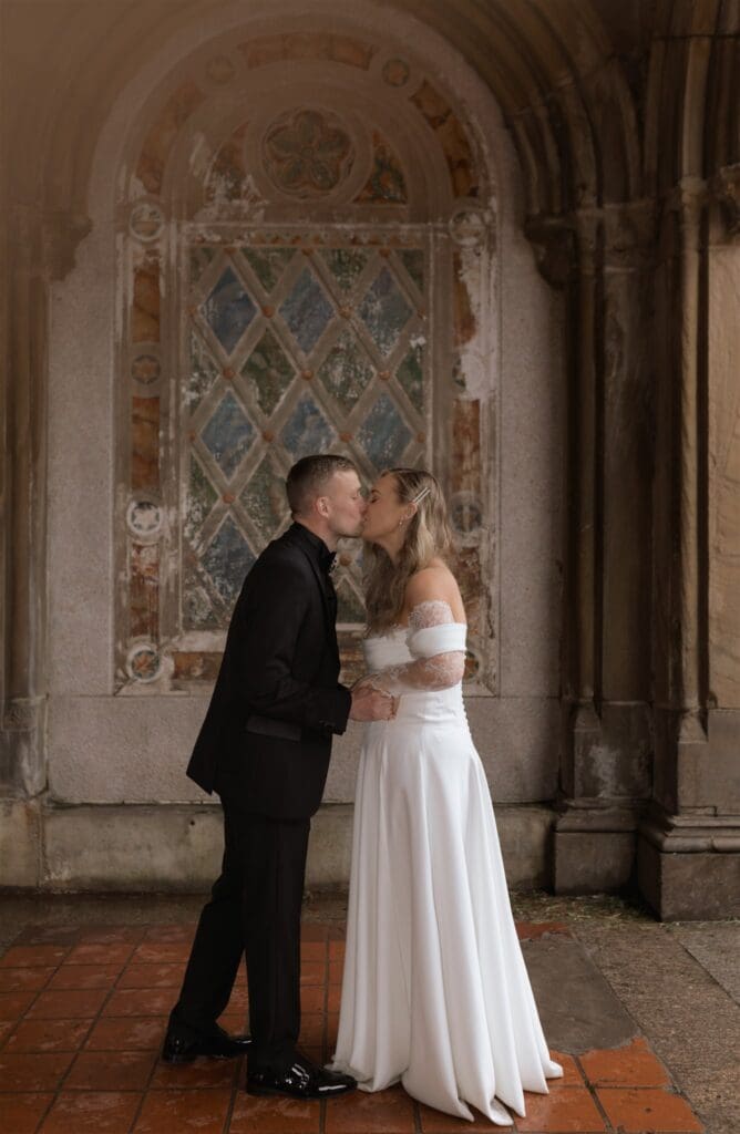 picture of the bride and groom kissing after their ceremony