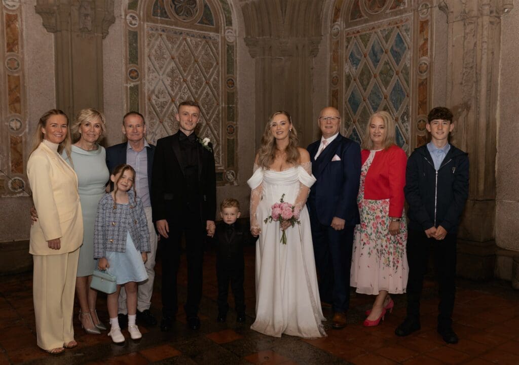 cute picture of the newlyweds and their family