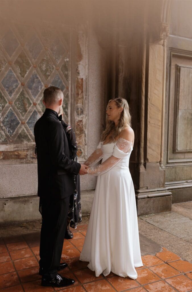 cute couple holding hands during their elopement ceremony