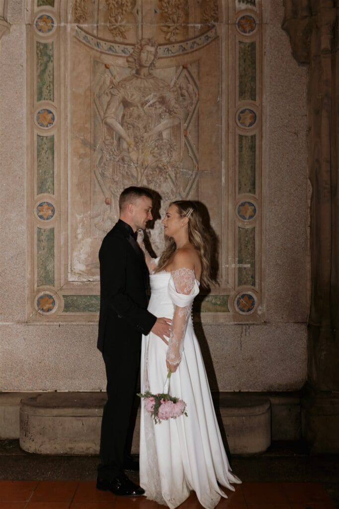 stunning picture of the newlyweds looking and smiling at each other