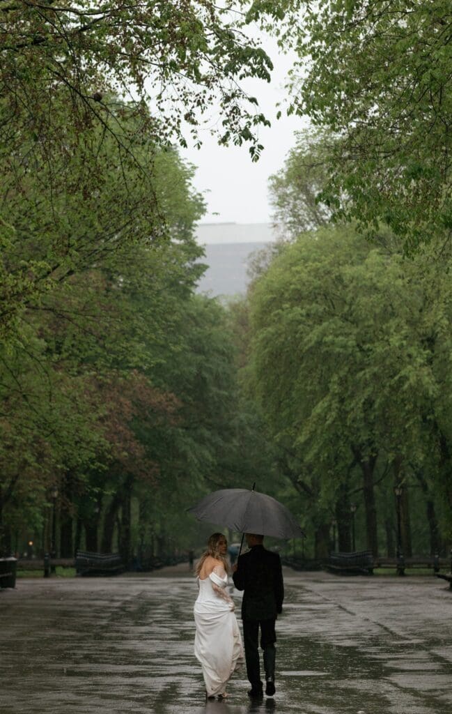 cute couple walking around central park during their photoshoot