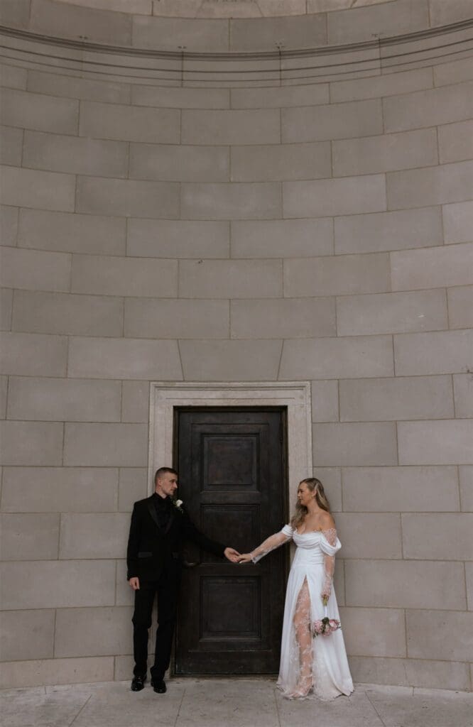picture of the newlyweds holding hands