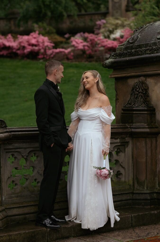 couple laughing with each other during their bridal portraits