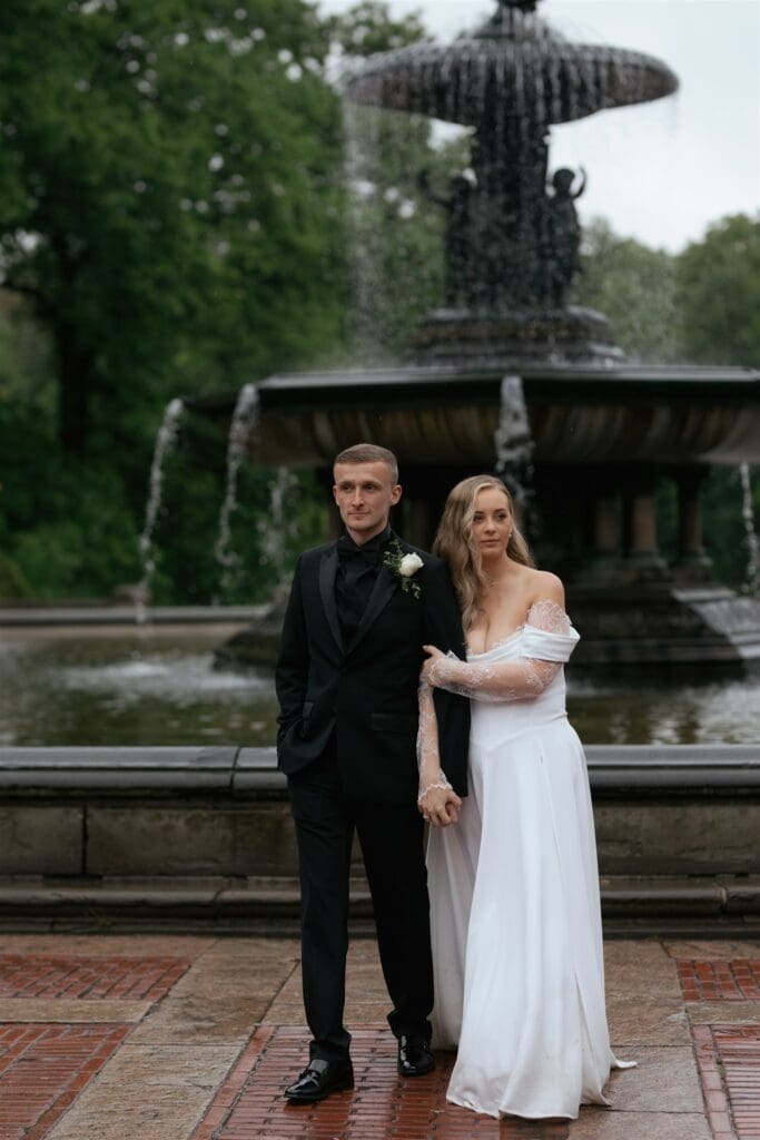 newlyweds holding hands during their photoshoot
