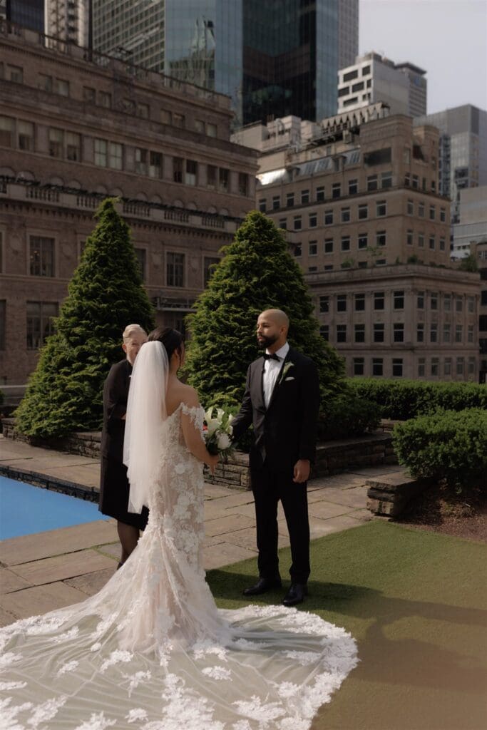 cute couple holding hands during their bridal portraits