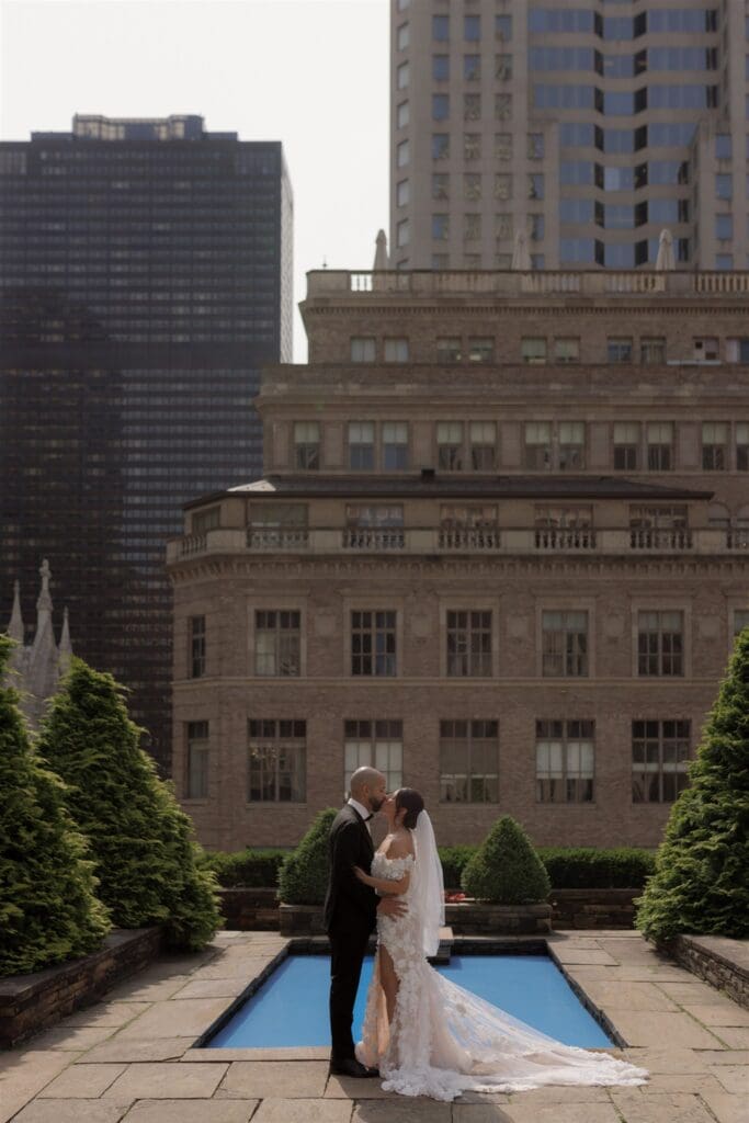 portrait of the newlyweds kissing