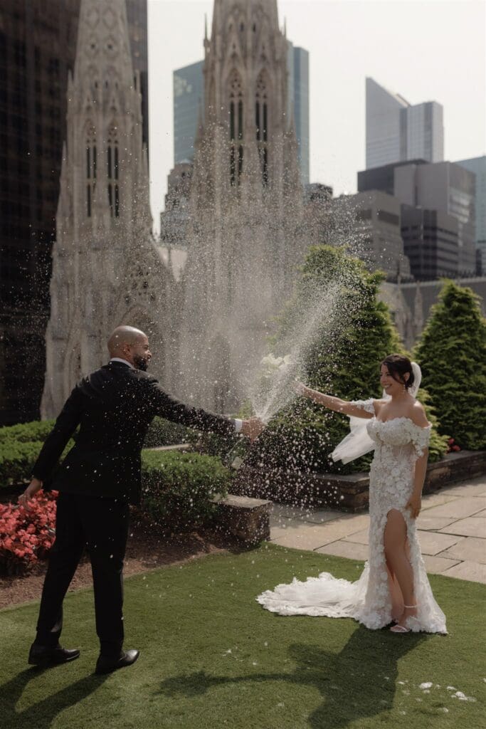 couple celebrating their elopement with champagne
