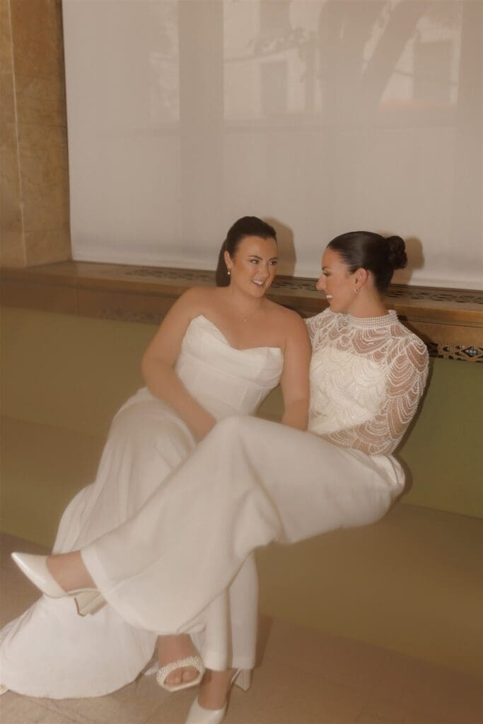 cute couple smiling at each other before their ceremony