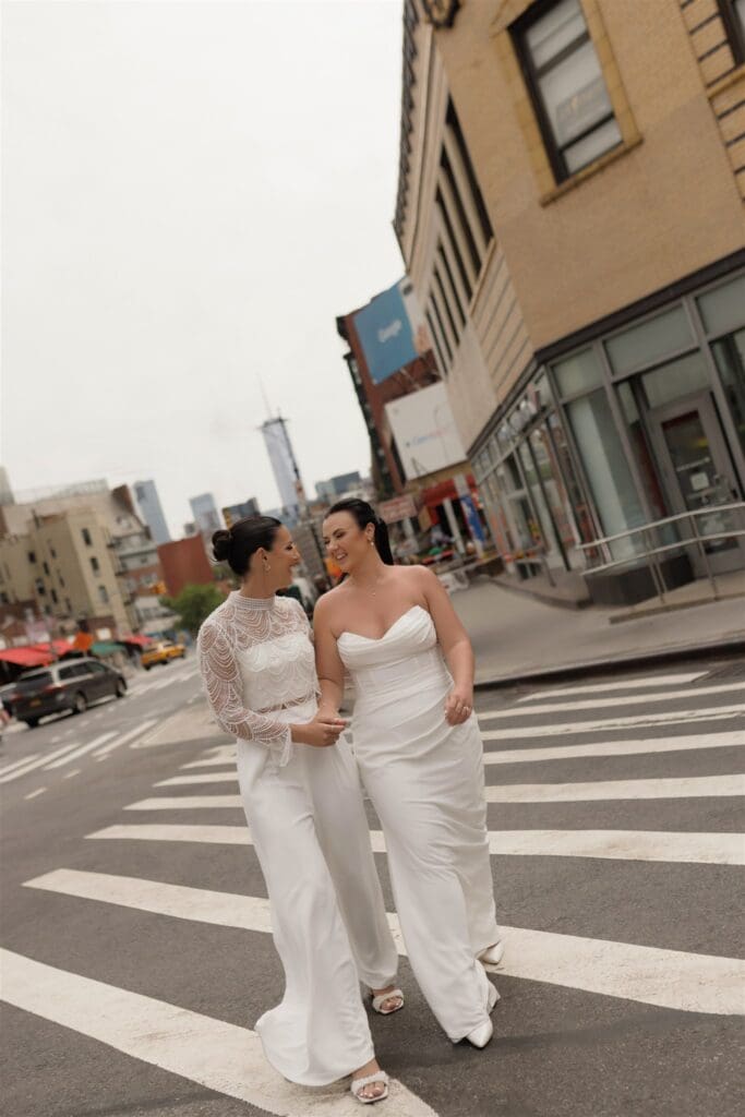 Cute couple laughing with each other during their photoshoot