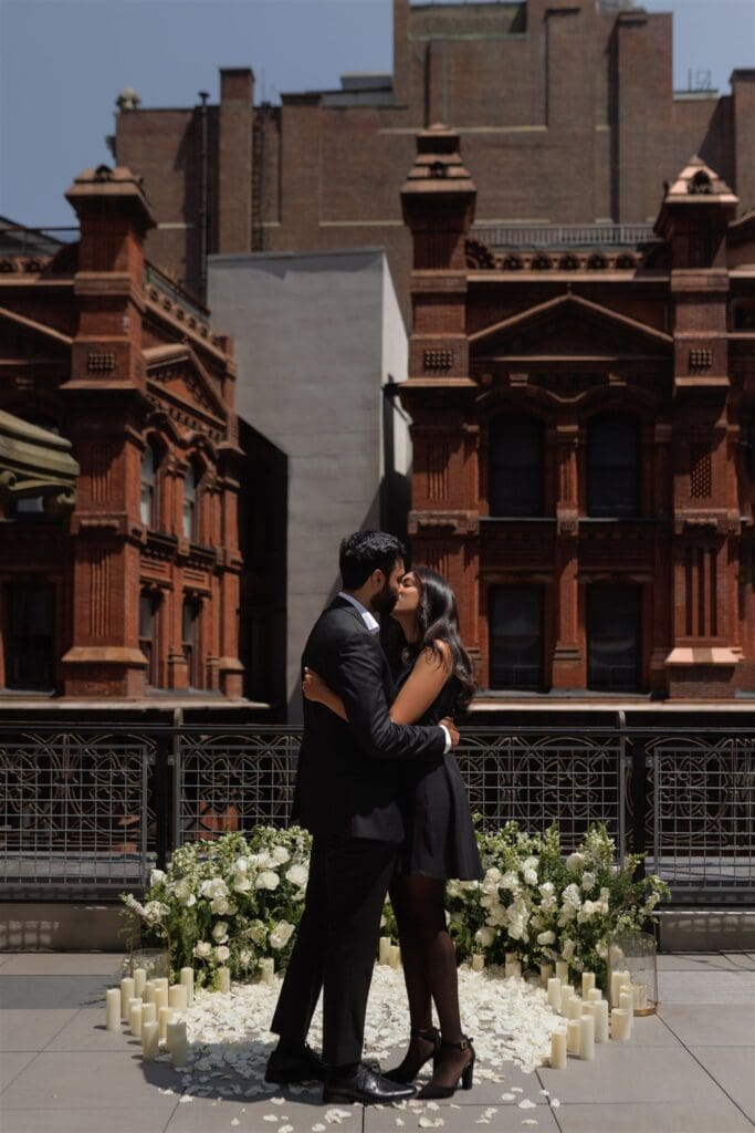 couple kissing after their proposal