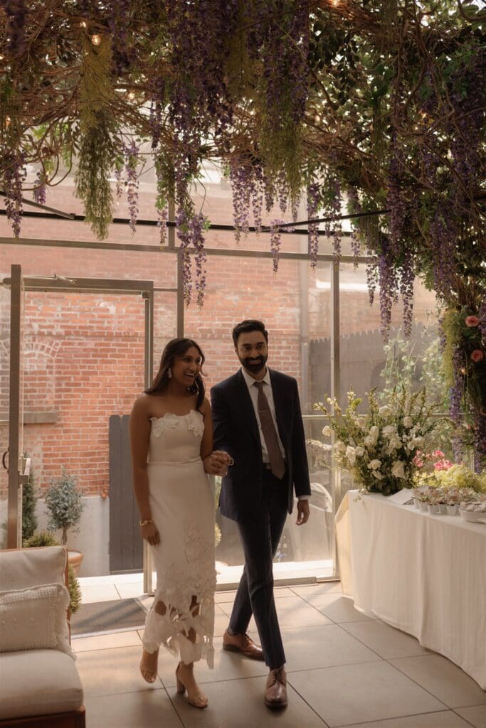 couple arriving at their engagement party