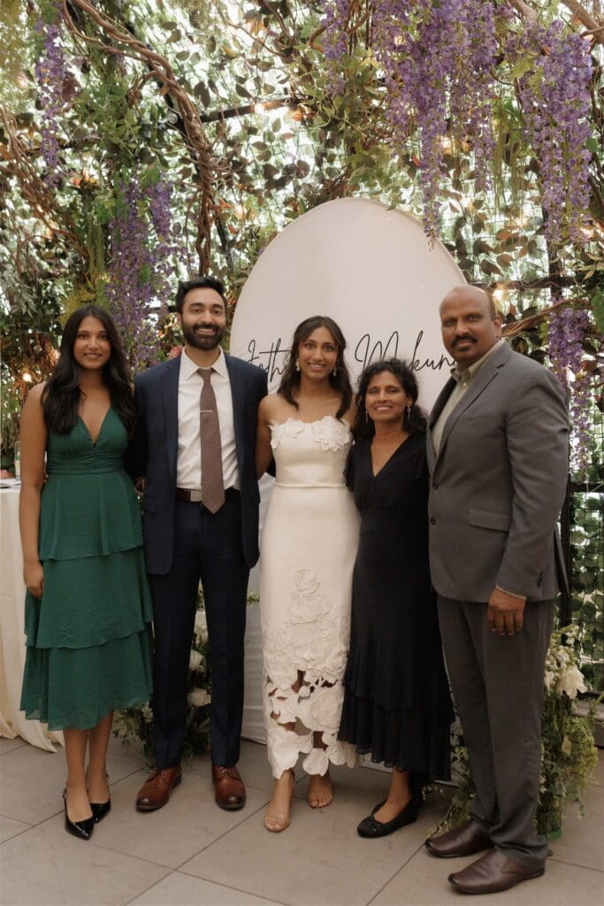 portrait of the newly engaged couple and their family