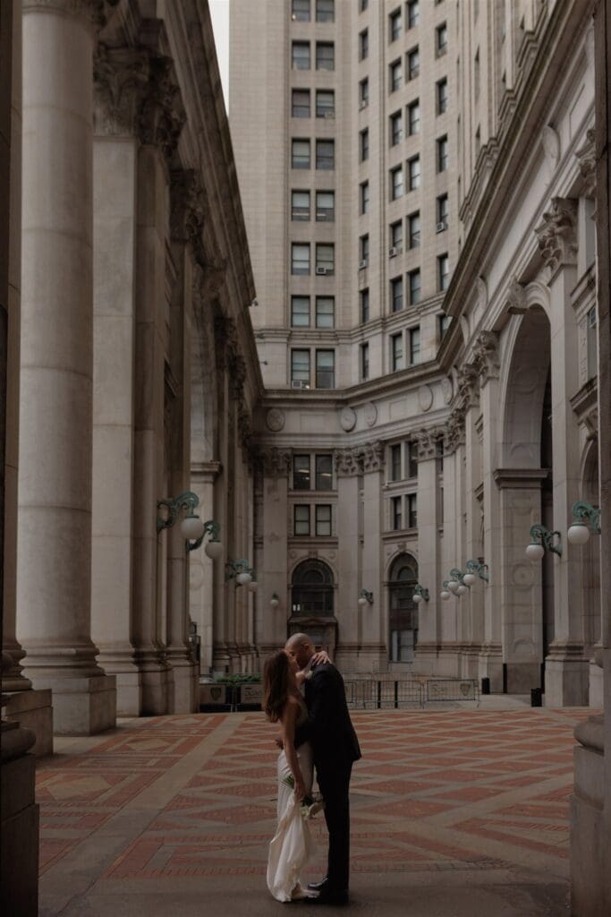 cute picture of the bride and groom kissing