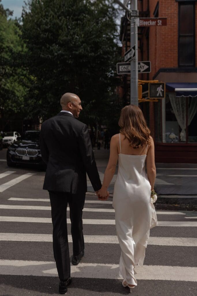 couple walking around during their bridal portraits