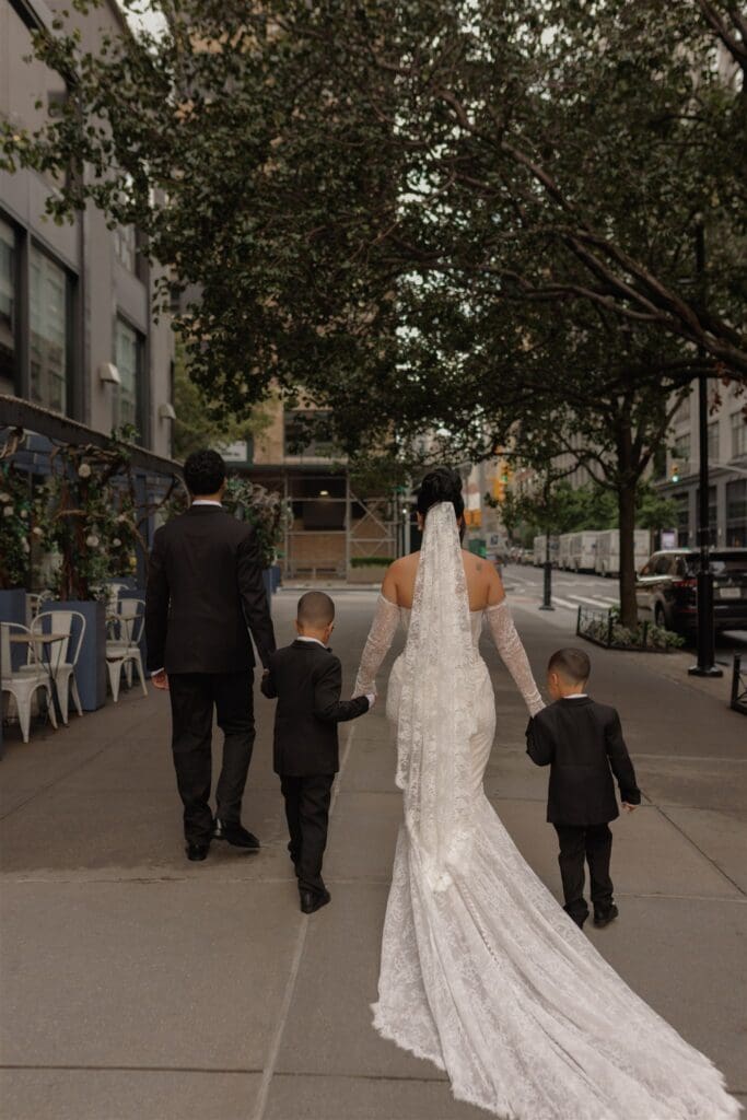 cute first look between the bride and her sons