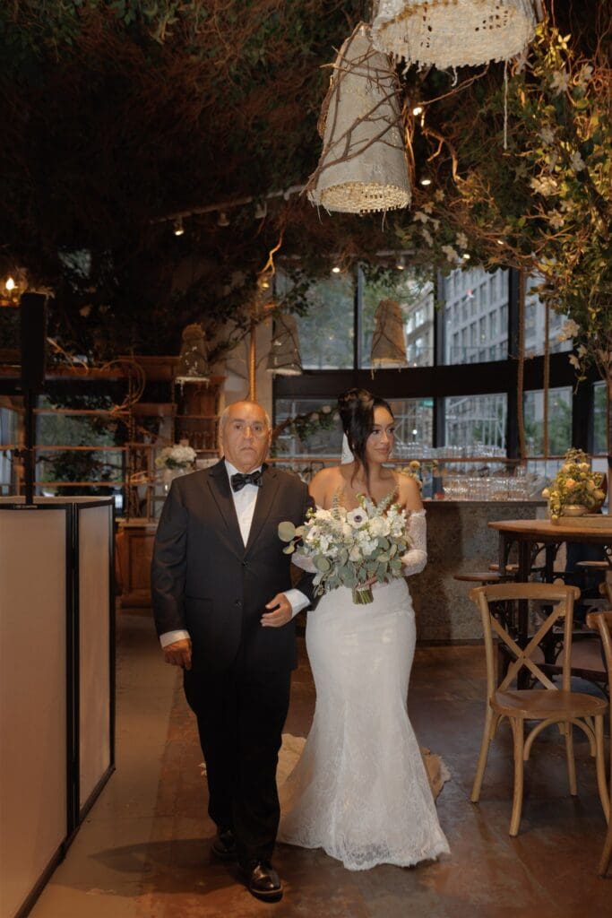 stunning picture of the bride walking down the aisle