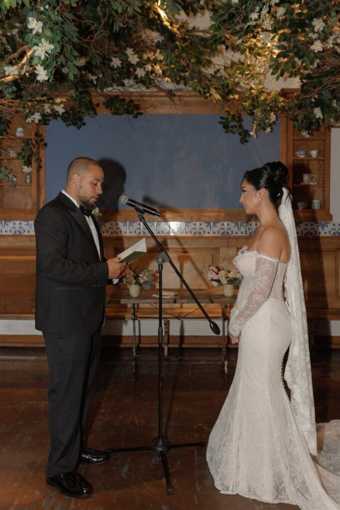 couple reading their vows during their ceremony