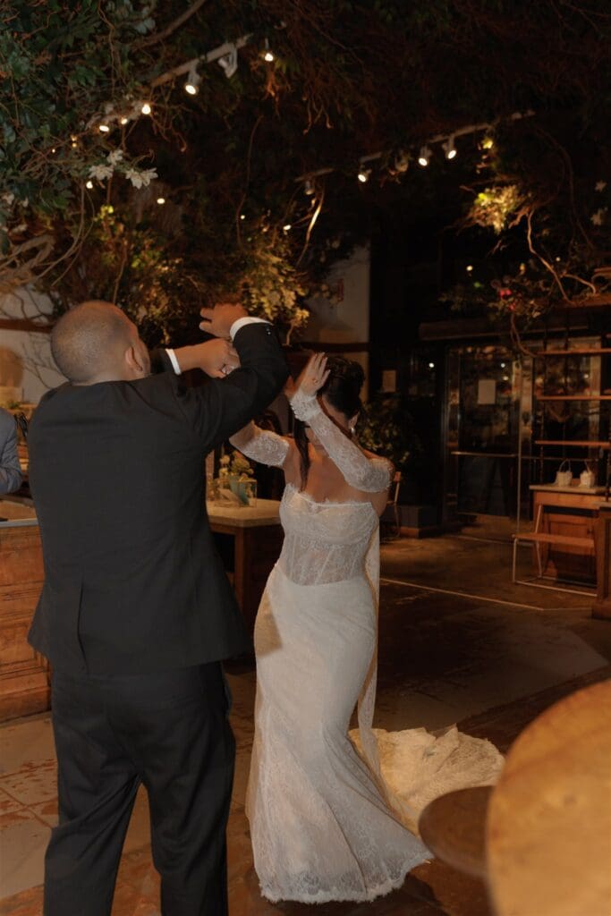 newlyweds dancing at their reception party