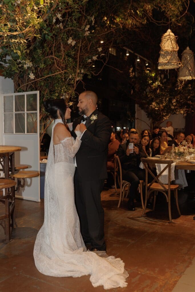 couple dancing at their reception party