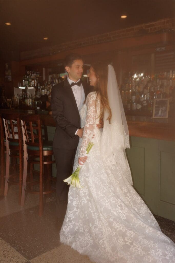 portrait of the newly married couple laughing with each other