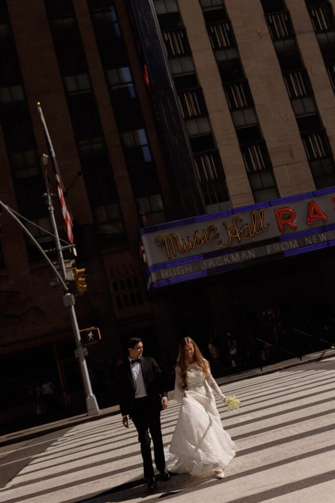 cute picture of the newlyweds holding hands