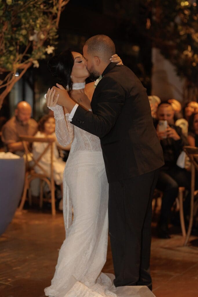 cute picture of the newlyweds kissing